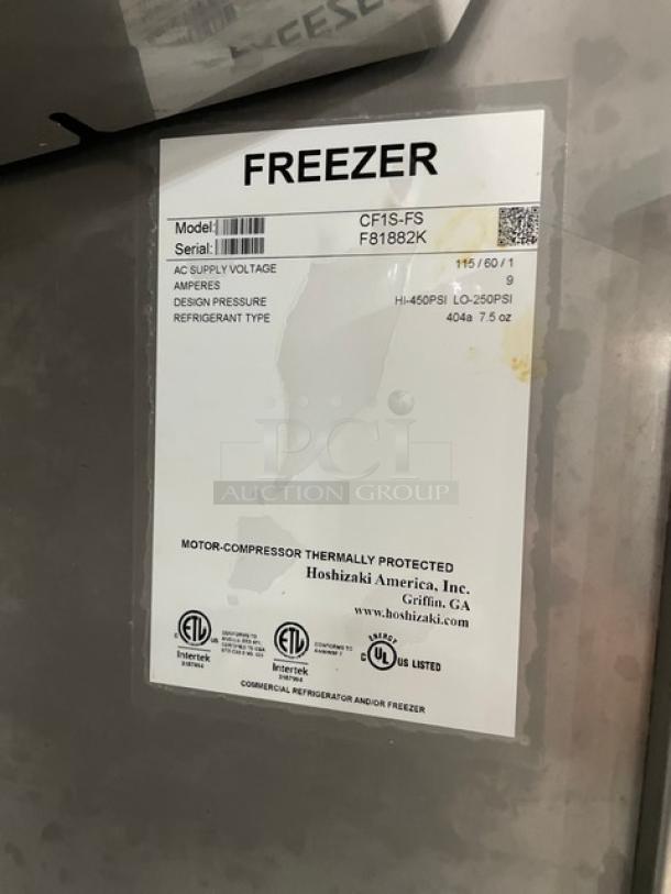 Hoshizaki Model CF1S-FS stainless steel single door reach-in freezer on casters with poly-coated wire racks, 115V, serial F81882K.