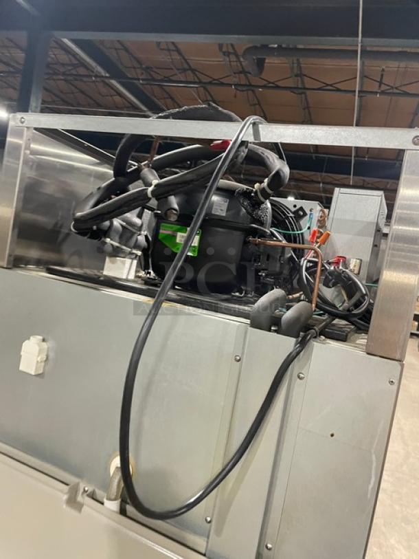 Hoshizaki commercial stainless steel single door reach-in freezer, model CF1S-FS, with poly coated wire racks, on casters.