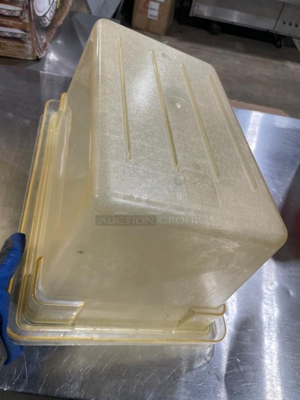 Cambro commercial clear food storage container with lid. Durable plastic, slightly used condition. Capacity and measurements not visible.
