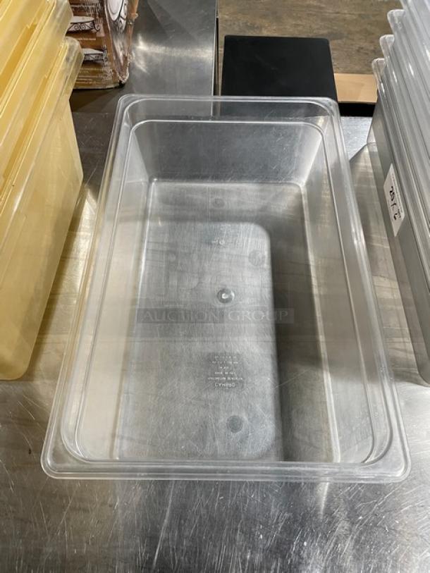 Cambro clear polycarbonate food pan, commercial-grade, translucent, rectangular, in good condition. Markings indicate make.