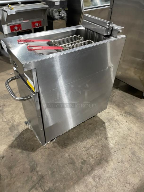 Empero stainless steel electric deep fat fryer with basket hanger, fry baskets, and casters. Appears in good condition.