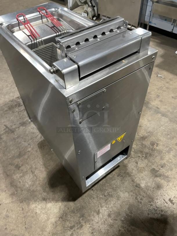 Empero Commercial stainless steel deep fat fryer on casters with basket hanger and fry baskets. Electric powered.