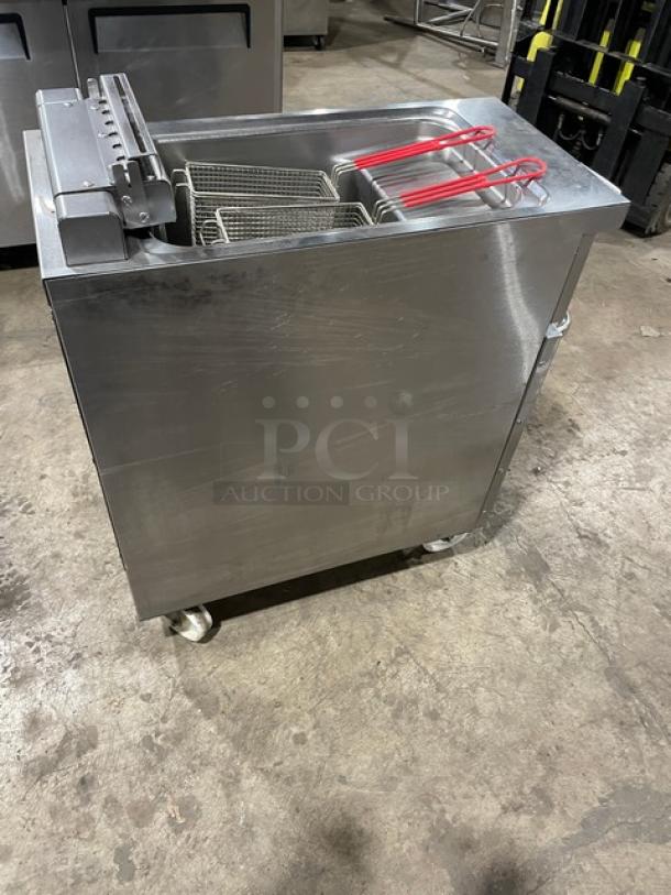 Empero commercial stainless steel electric deep fat fryer with basket hanger, fry baskets, and casters, in good condition.