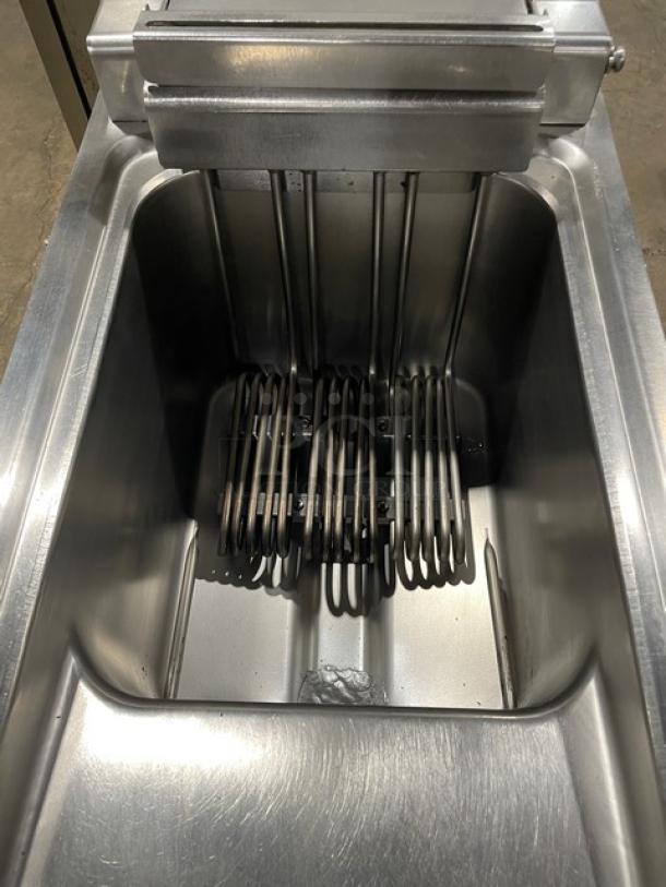 Empero commercial stainless steel electric deep fat fryer with basket hanger and fry baskets, mounted on casters.