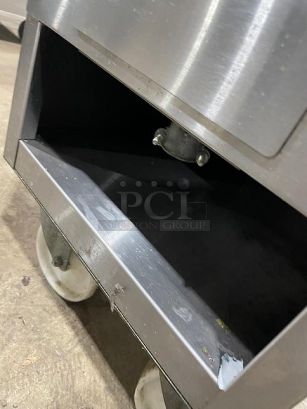 Empero commercial stainless steel electric deep fat fryer on casters, featuring basket hanger and fry baskets, in used condition.