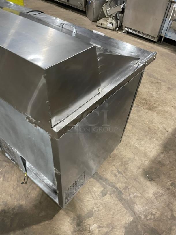 Turbo-Air MST-72-30-N stainless steel 3-door refrigerated prep table, poly coated wire rack, on casters, 115V.