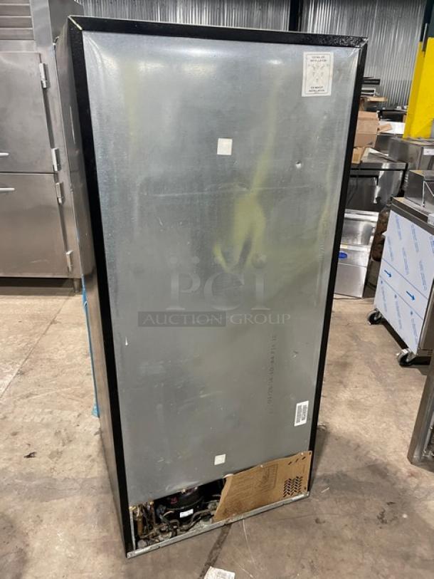 Frigidaire Commercial Stainless Steel Refrigerator/Freezer Combo, Model FFTR1821QS3, with clear drawers and adjustable shelves.