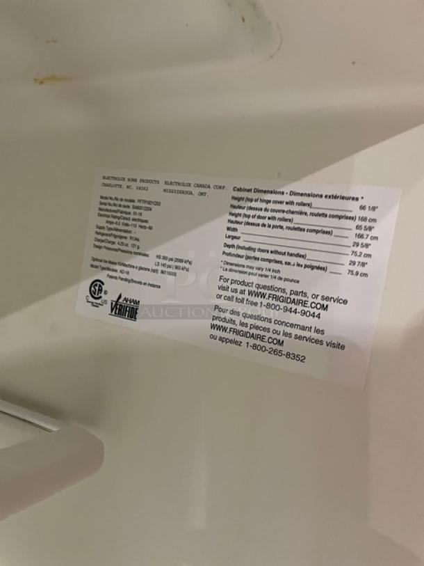 Label inside Frigidaire FFTR1821QS3 refrigerator/freezer combo, showing model, dimensions, and contact information.