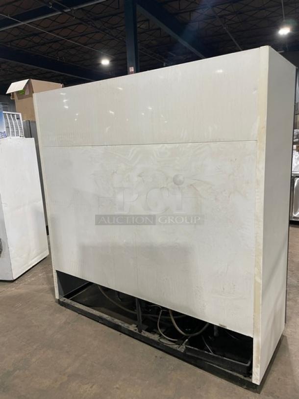 True GDM-72 commercial refrigerator, triple glass swing doors, poly-coated wire racks. Model GDM-72, SN: 1-2834463, 115V.