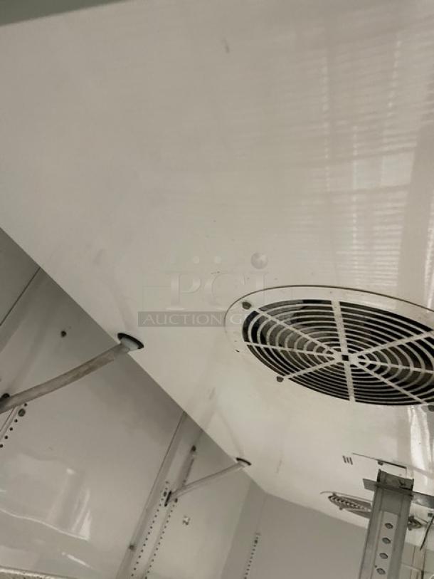 True GDM-72 commercial refrigerator fan and interior view, showing poly coated wire racks and durable construction.
