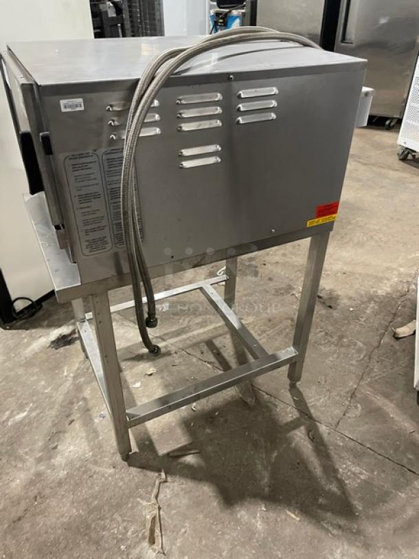 Groen HY3E stainless steel 3-pan convection steamer on open base stand, 208V 3-phase, built-in pan racks, used condition.