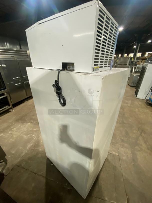 Leer Commercial Ice Merchandiser Freezer, Model 301UC25MG, 115V. White, single glass swing door. Visible wear, suitable for indoor use. 