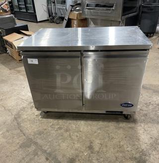 Entree UR48 stainless steel 2-door undercounter refrigerator, poly-coated wire racks, on casters, model UR48, 115V, 1-phase.