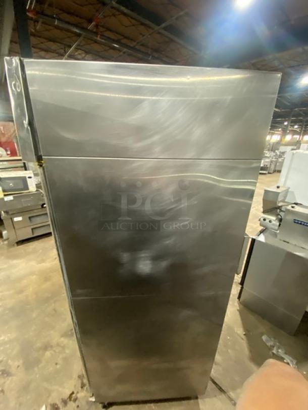 Hoshizaki triple glass door reach-in merchandiser refrigerator, model CR3SFGYCR, stainless steel, on casters, poly-coated wire racks.
