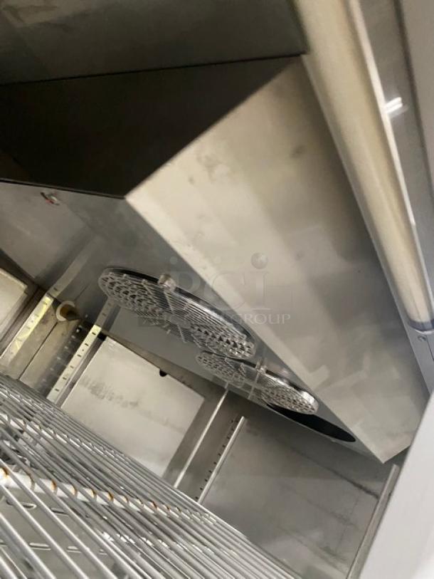 Hoshizaki CR3SFGYCR stainless steel triple glass door reach-in refrigerator, poly-coated wire racks, on casters, 115V 1 Phase.