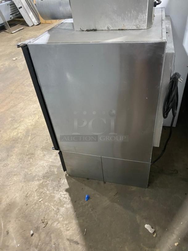 Glastender MVF24GNL 2018 stainless steel/black single glass door mug chiller with poly coated wire racks, 120V, used condition.