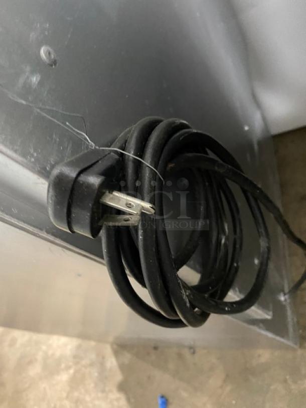 Coiled power cord for a Glastender MFV24-GNL mug chiller/froster. Black with standard plug.