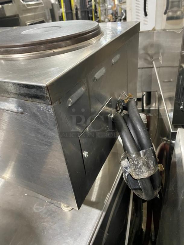 Commercial stainless steel dual burner hot plate, electric-powered, countertop model, on legs, with visible power cord.