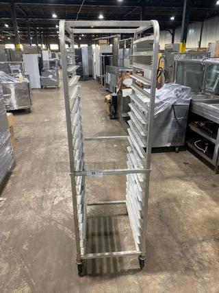 Winco ALRK-20 aluminum 20-pan end-load sheet pan rack on casters, shown in a commercial setting.