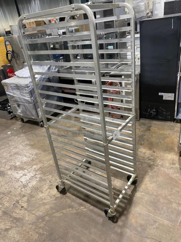 Winco ALRK-20 commercial aluminum pan rack with 20 slots, end-load design, on casters. Used, good condition.