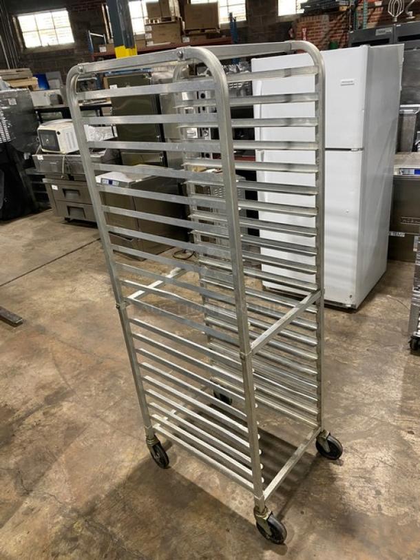 Winco ALRK-20 aluminum 20-pan rack on casters, end-load design, excellent condition, ideal for commercial kitchens.