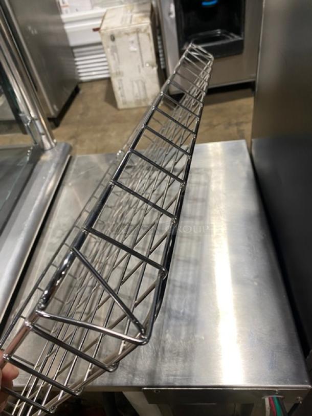 Commercial chrome plated full-sized bagel/pastry wired rack in excellent condition, ideal for bakeries.