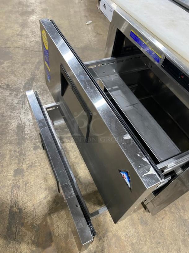 Everest Commercial Stainless Steel 2 Drawer Refrigerated Bain Marie Style Salad/Sandwich Prep Table with cutting board, on casters.