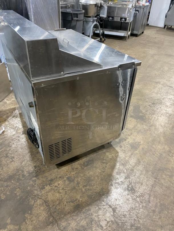 Everest EPBNR2 stainless steel 2-door refrigerated bain marie prep table, 115V 1 Phase, on casters.