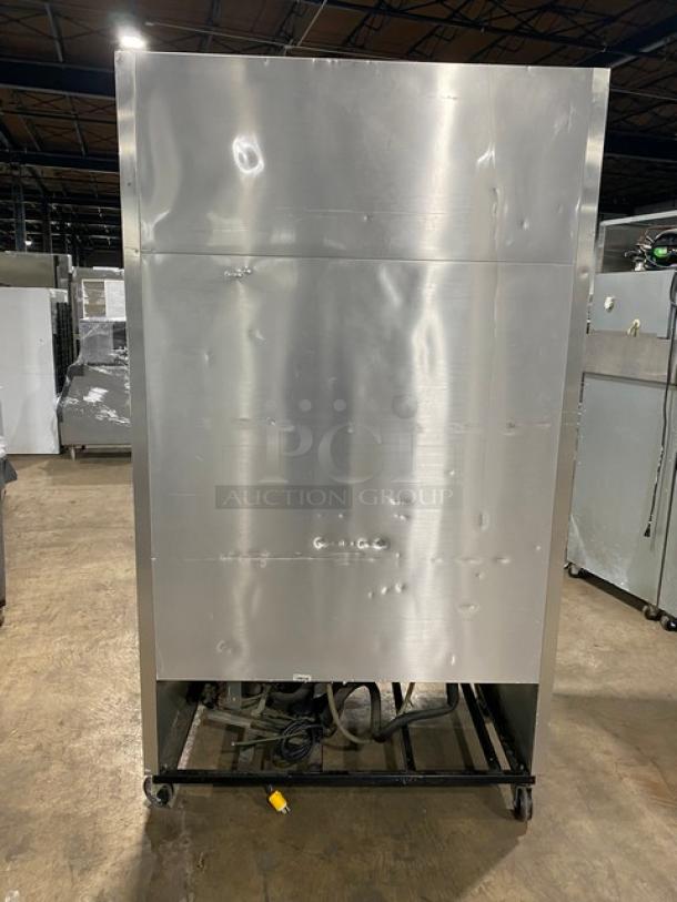 True T-43 commercial stainless steel 2-door reach-in refrigerator, Energy Star certified, includes poly-coated wire rack, on casters.