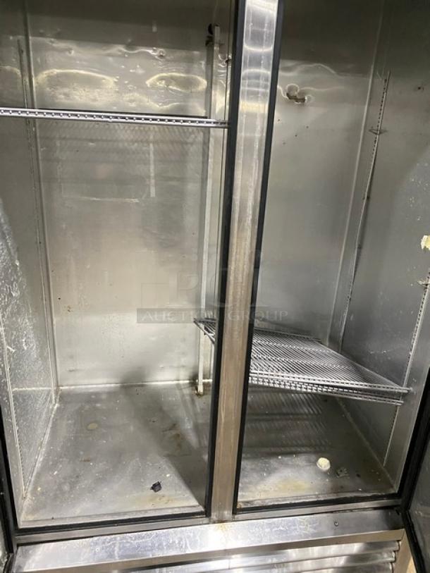 True T43 stainless steel 2-door reach-in refrigerator, Energy Star certified, poly-coated wire rack, on casters.