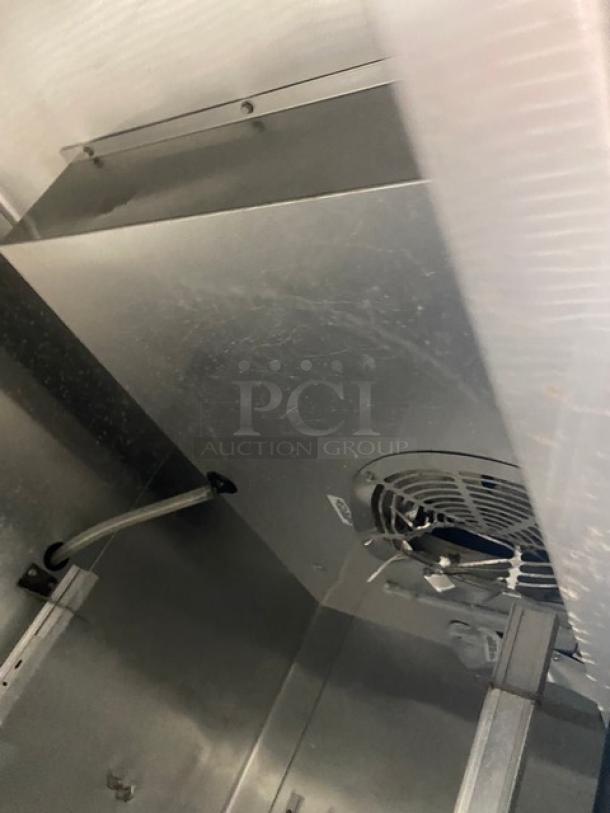 True T-43 commercial refrigerator interior, stainless steel, visible poly-coated wire rack, Energy Star certified, model T-43.
