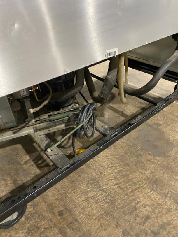 True T-43 Commercial Stainless Steel 2-Door Refrigerator, Energy Star Certified, on Casters, 115V, Interior Wiring Visible.