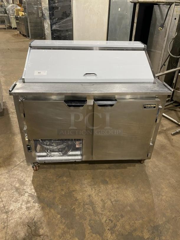 CoolTech CMPH-48BMO stainless steel 2-door prep table with chrome rack, 2018 model, on casters, used condition.