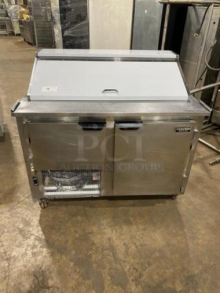 CoolTech CMPH-48BMO stainless steel 2-door prep table with chrome rack, 2018 model, on casters, used condition.