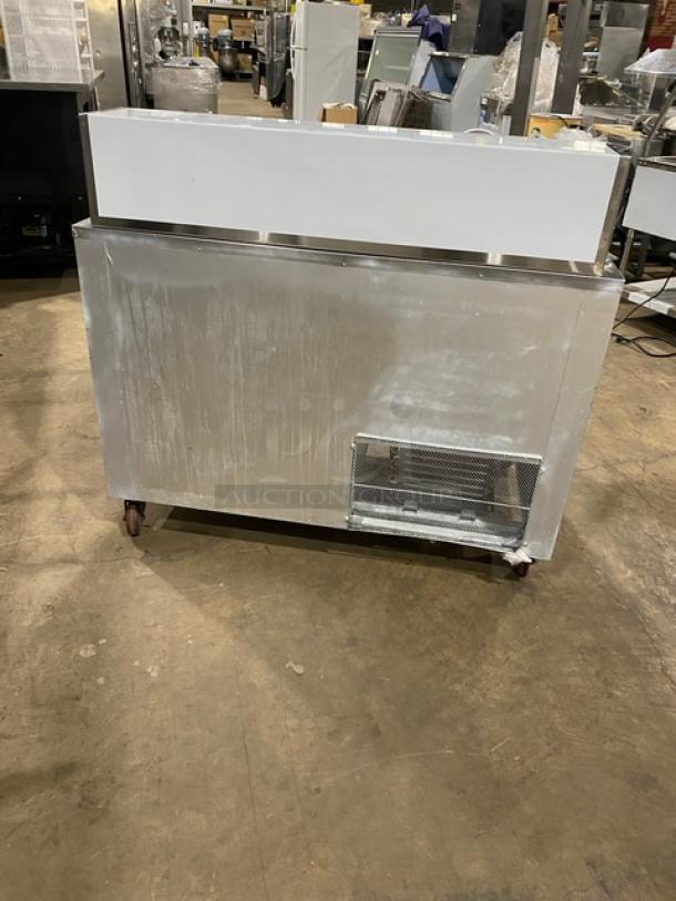 CoolTech 2018 stainless steel 2-door refrigerated prep table, model CMPH-48BMO, on casters, with chrome wire rack.