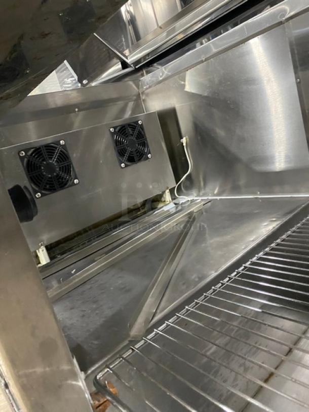 CoolTech CMPH-48BMO refrigerated prep table, stainless steel, 2 doors, chrome wire rack, internal view, used condition.