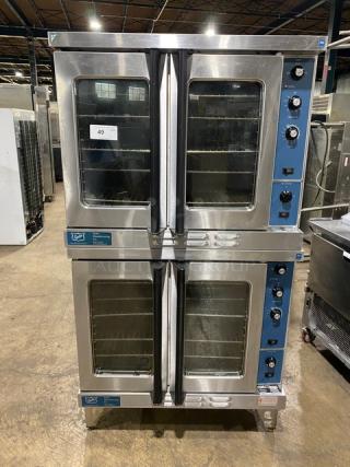 Duke Commercial Stainless Steel Natural Gas Powered Double Stacked Convection Oven! With Thermostatic Controls! With Wired Oven Racks! Model: E101-GV SN: 02205555 / 02205234! On Legs! 2X Your Bid Makes One Unit! - Item #1202283
