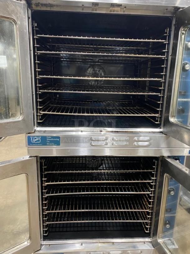 Duke E101GV stainless steel double-stacked convection oven, natural gas, thermostatic controls, wired racks, model visible.