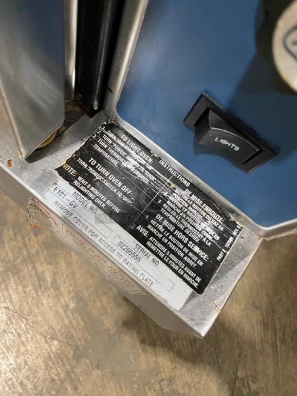 Duke E101GV convection oven label showing model, serial numbers, and instructions. Natural gas, double-stacked setup.