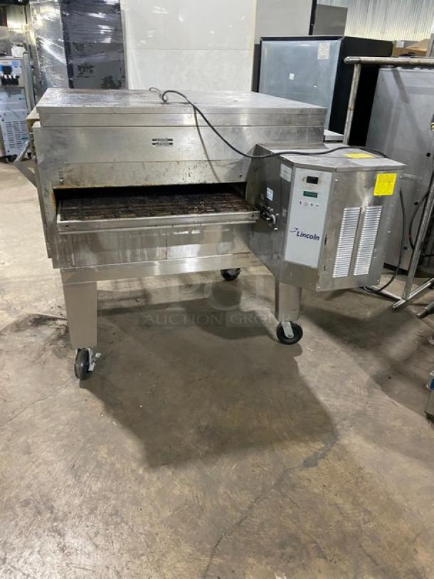 Lincoln Impinger 1450 Series stainless steel conveyor oven, natural gas, 120V, 1 phase, on casters, model 1450000UK1801.