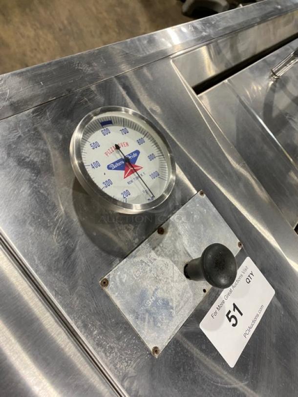 Bakers Pride stainless steel pizza deck oven, natural gas powered, with thermostatic control and temperature gauge visible.