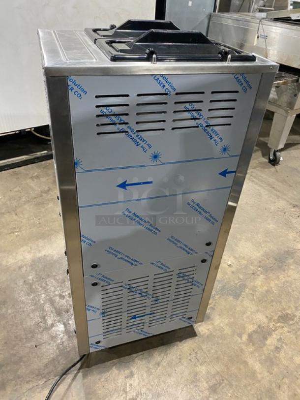 Ineo Model 6240 commercial soft serve machine, stainless steel, dual flavor & twist, 2 hoppers, 220V 3 Phase, on casters.