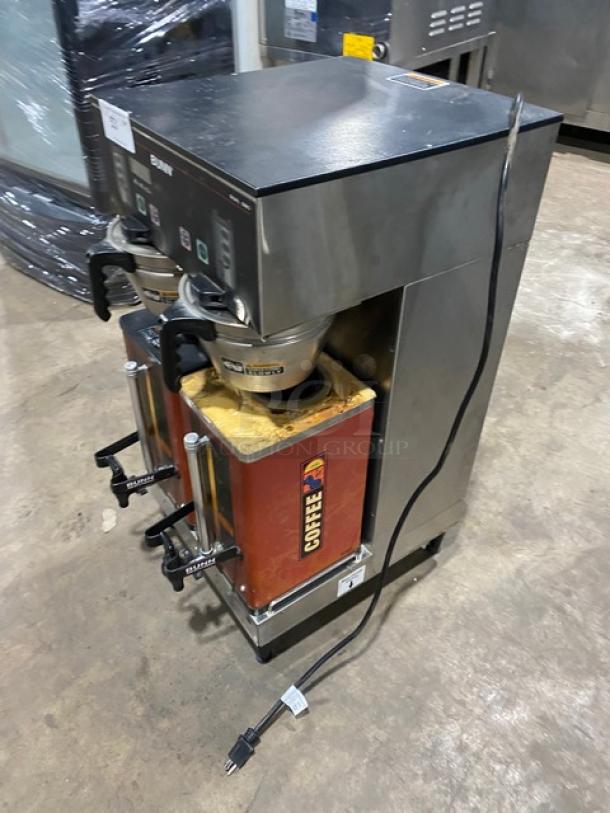 Bunn Dual DBC Series Commercial Twin Coffee Brewer, Model DUALSHDBC, stainless steel, with funnels and portable servers.