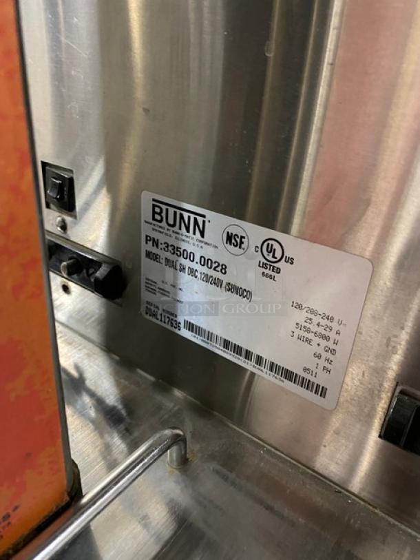 Bunn Dual DBC Series Commercial Stainless Steel Coffee Brewer with funnels and servers. Model: DUALSHDBC, 120/208-240V.