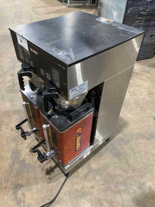 Bunn Dual DBC Series stainless steel twin coffee brewer with funnels and Safety-Fresh servers, model DUALSHDBC, on legs.