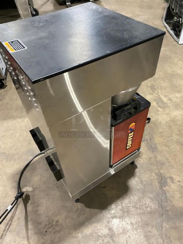 Bunn Dual DBC Series commercial stainless steel coffee brewer. Model DUAL SH DBC. Includes funnels and portable servers.