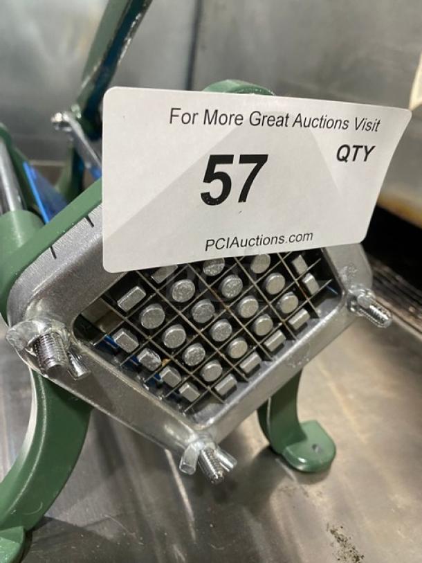 Commercial green heavy-duty manual French fry/potato cutter with sturdy legs, grid blade, and auction tag number 57.