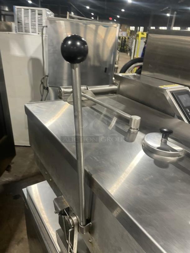 Cleveland Range stainless steel electric countertop tilted braising pan, featuring a control lever and secure lid, in good condition.