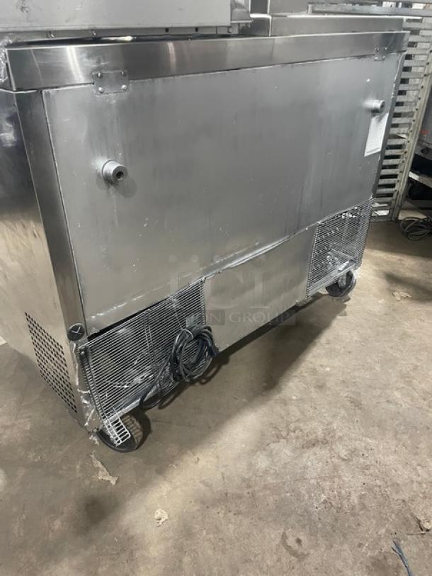 Migali CU48R undercounter refrigerator, stainless steel, with poly-coated wire racks, on casters, 115V, commercial use.