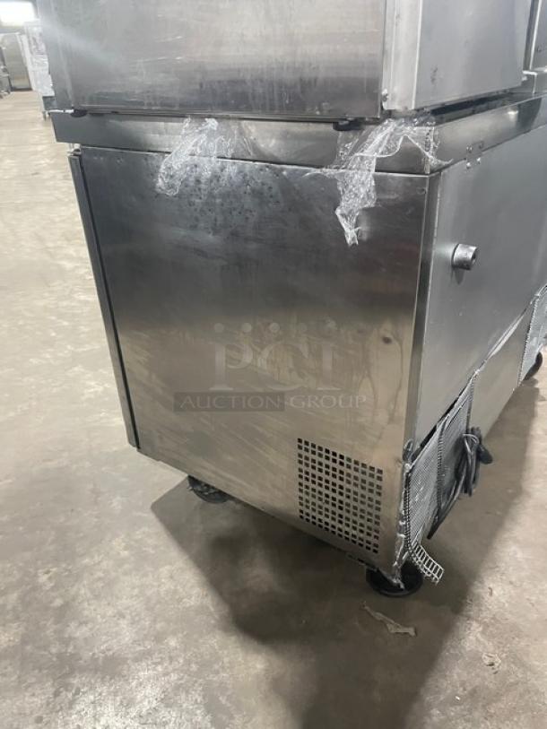 Migali 2016 stainless steel undercounter worktop refrigerator, model CU48R, with poly coated wire racks, on casters.